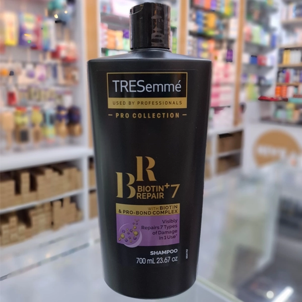 شامپو ترزمه مشکی  7 کاره اصل ترمیم کننده انواع  آسیب مو 700 میل | TRESemme' BIOTIN REPAIR Shampoo